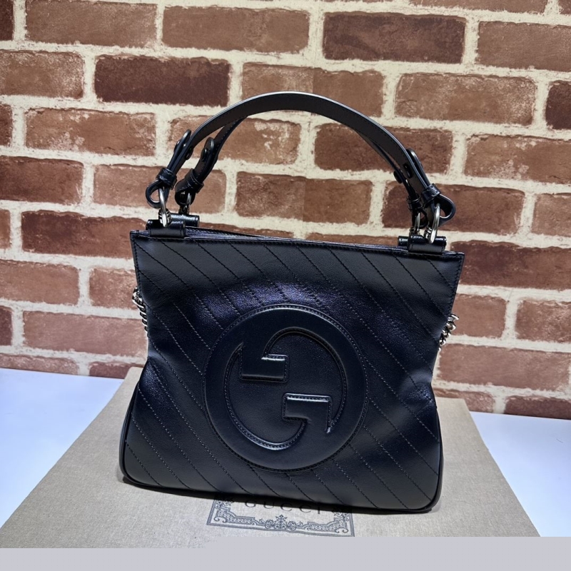 G*u*i top handle bags